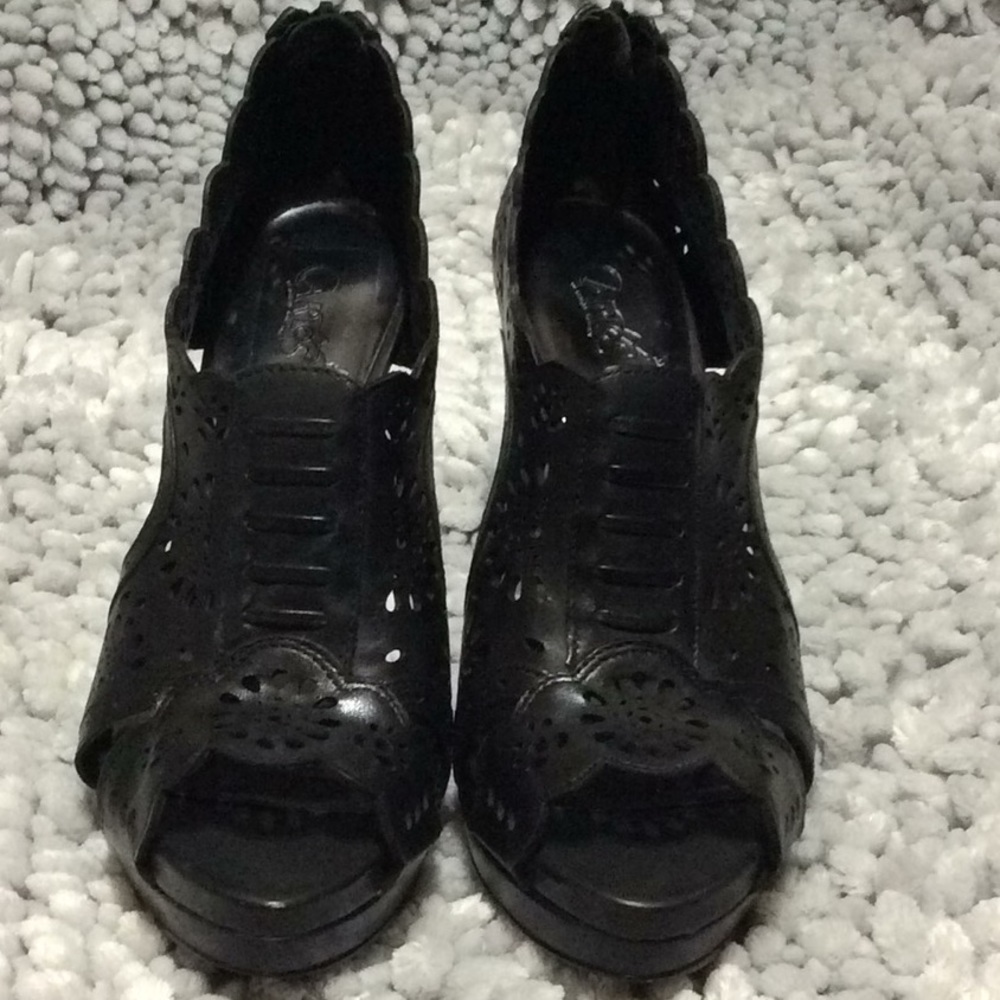 Carlos Santana heels